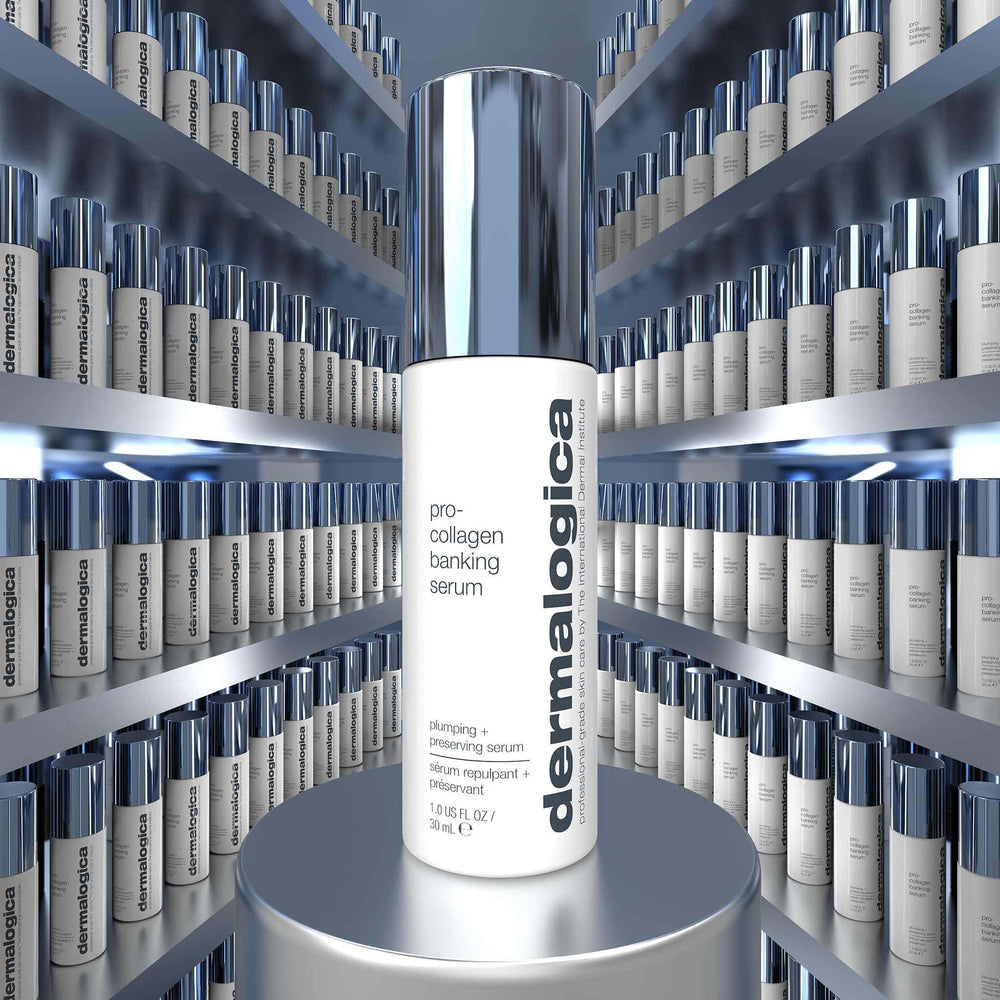 dermalogica pro-collagen banking serum bottle on a pedestal with shelves of the brand's products in the background